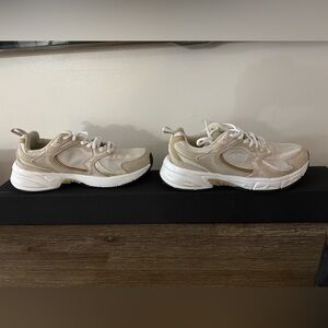 Beige and Black Athletic Shoes